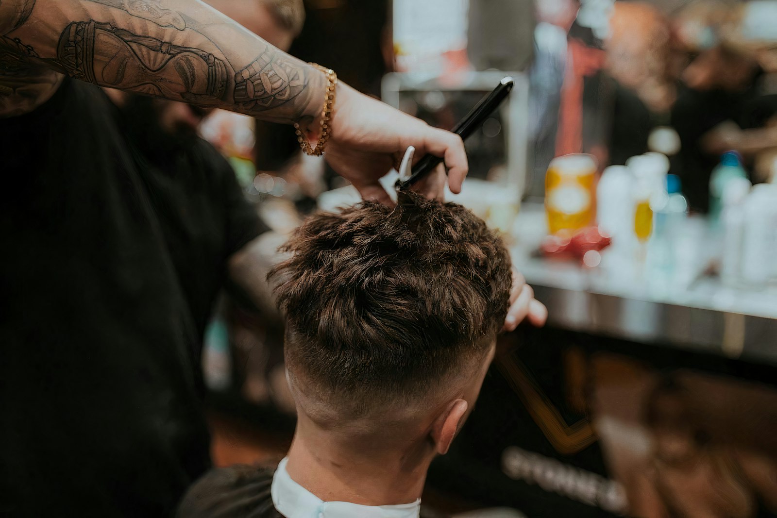 Barber tools laid out on leather